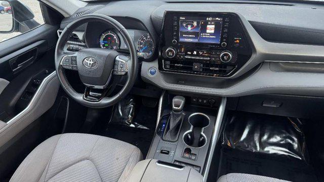 used 2021 Toyota Highlander Hybrid car, priced at $30,836