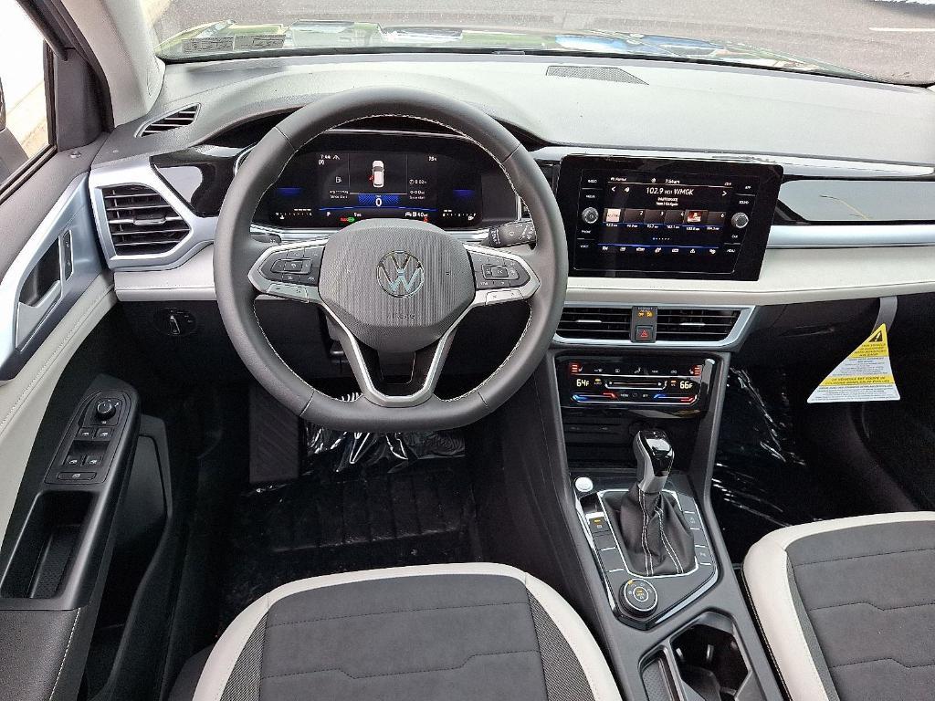 new 2025 Volkswagen Taos car, priced at $31,728