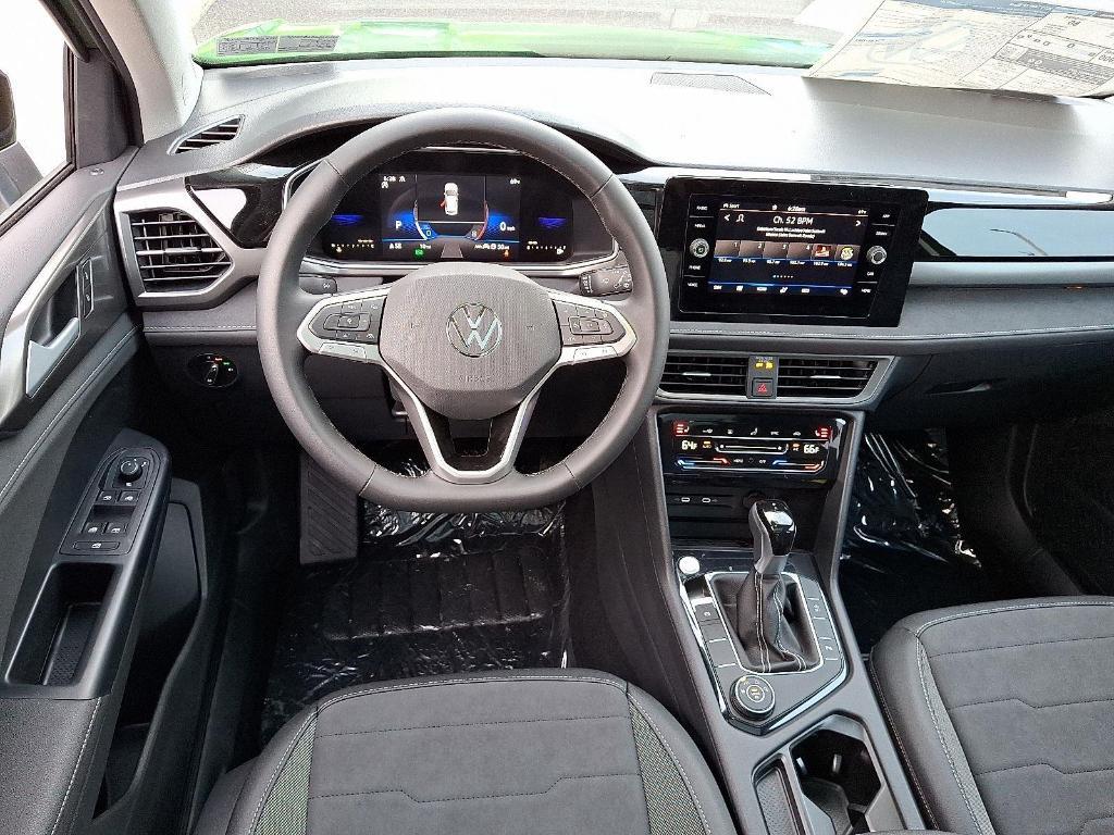 new 2025 Volkswagen Taos car, priced at $33,672