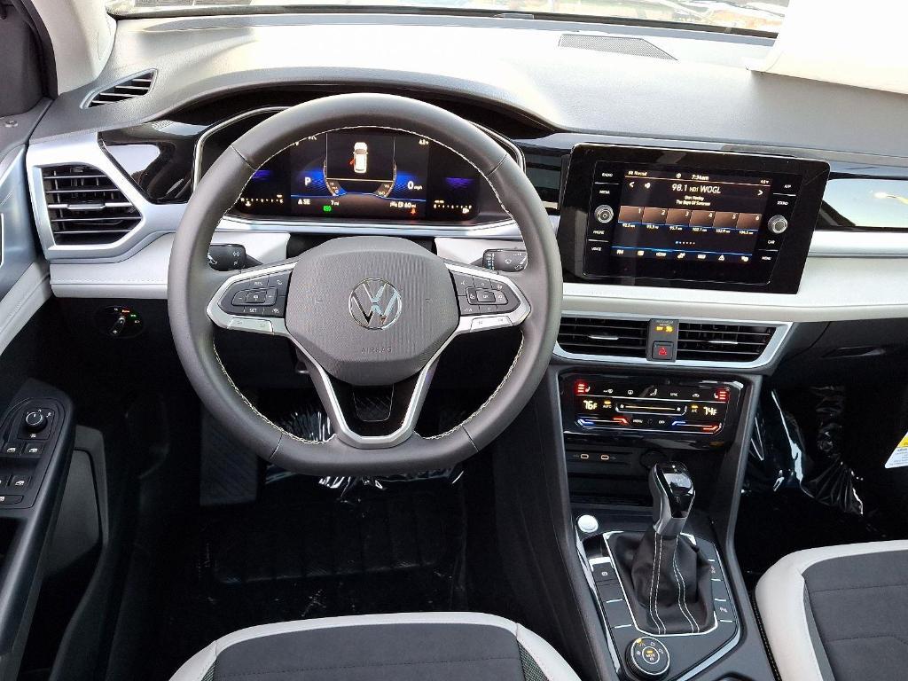 new 2025 Volkswagen Taos car, priced at $31,088