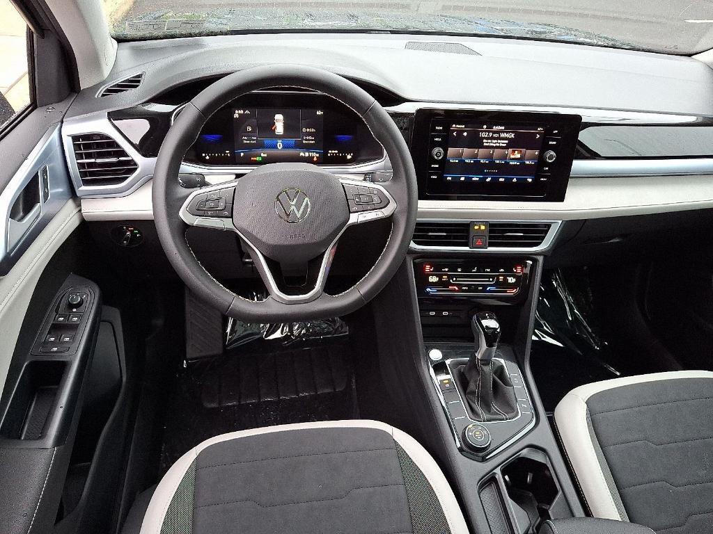 new 2025 Volkswagen Taos car, priced at $31,728