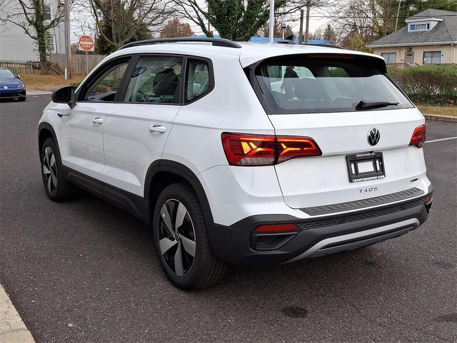 new 2024 Volkswagen Taos car, priced at $28,673