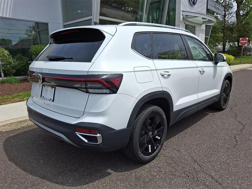 new 2025 Volkswagen Taos car, priced at $30,306