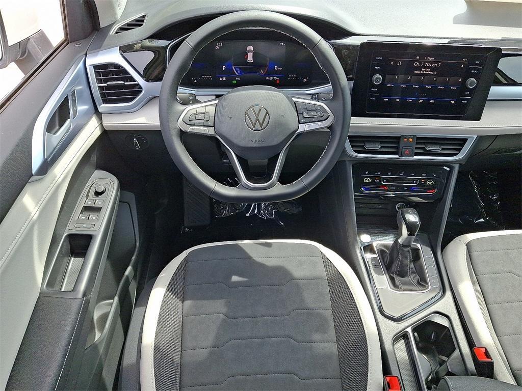 new 2025 Volkswagen Taos car, priced at $30,306