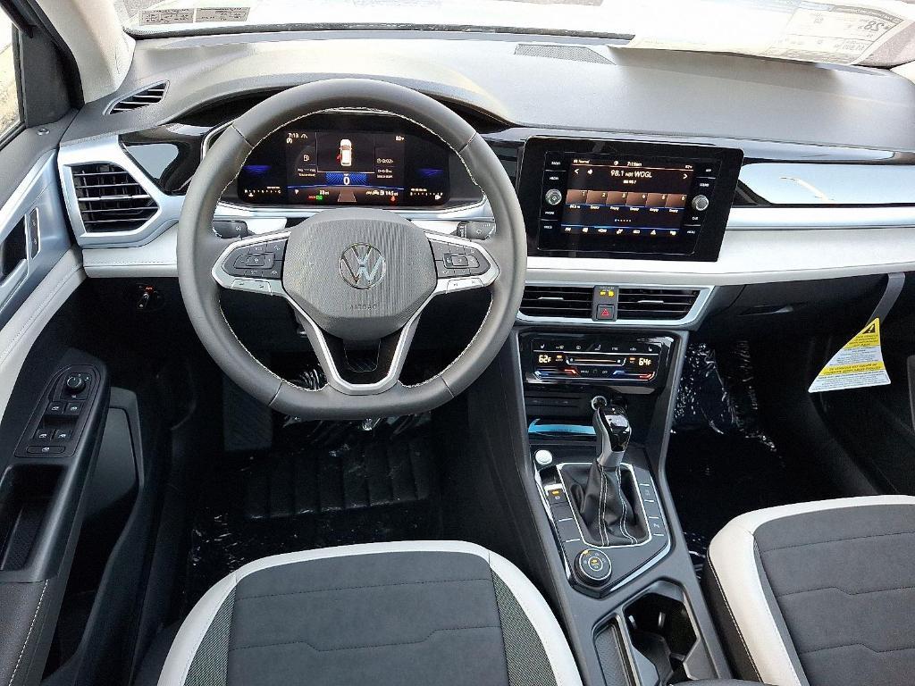 new 2025 Volkswagen Taos car, priced at $32,921