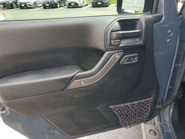 used 2016 Jeep Wrangler Unlimited car, priced at $17,576