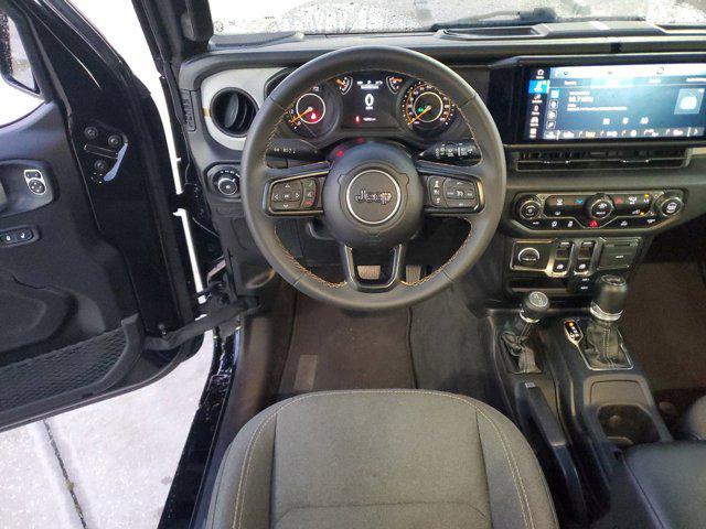 used 2024 Jeep Wrangler car, priced at $32,198