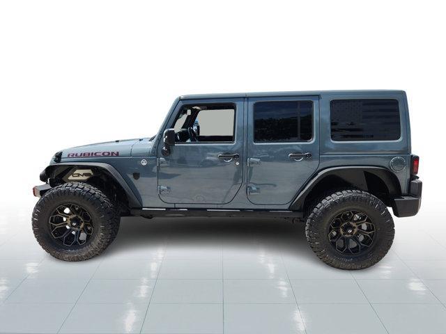 used 2015 Jeep Wrangler Unlimited car, priced at $23,771