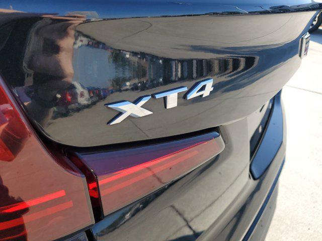 used 2019 Cadillac XT4 car, priced at $19,352