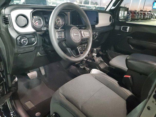 used 2024 Jeep Wrangler car, priced at $37,881