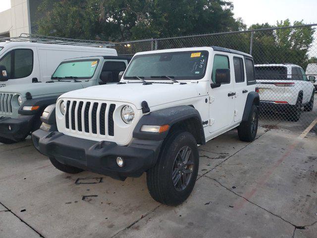 used 2024 Jeep Wrangler car, priced at $38,211