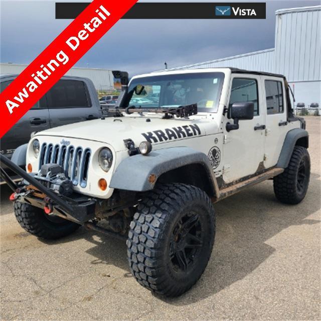 used 2010 Jeep Wrangler Unlimited car, priced at $16,792