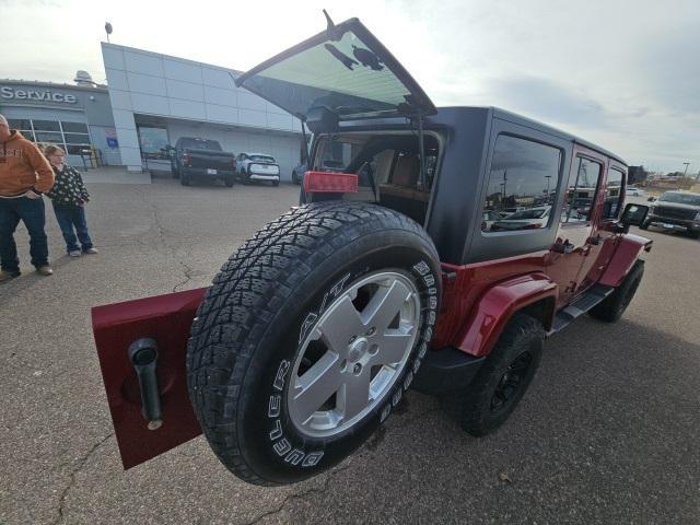 used 2011 Jeep Wrangler Unlimited car, priced at $14,791