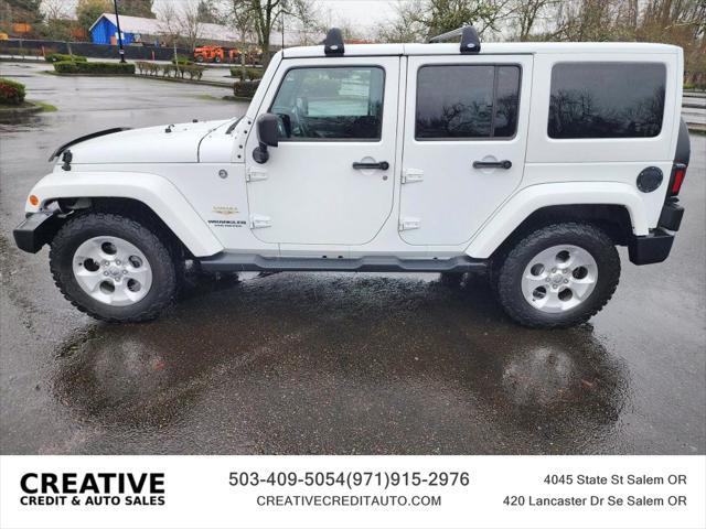 used 2014 Jeep Wrangler Unlimited car, priced at $20,990