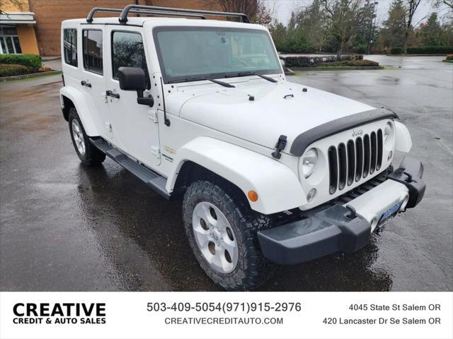 used 2014 Jeep Wrangler Unlimited car, priced at $20,990