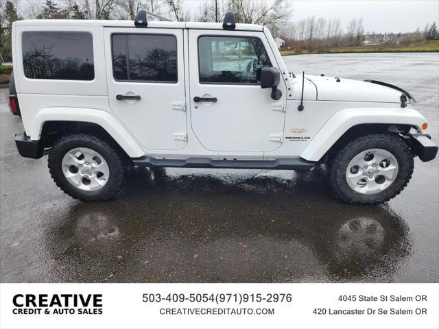 used 2014 Jeep Wrangler Unlimited car, priced at $20,990