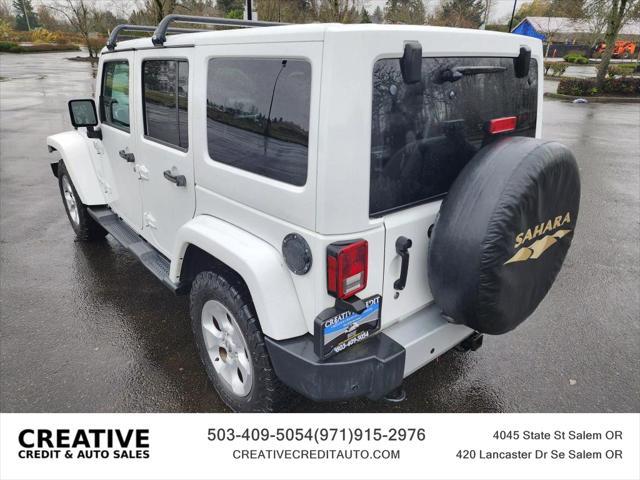 used 2014 Jeep Wrangler Unlimited car, priced at $20,990