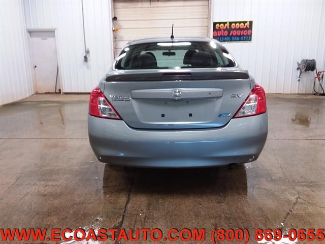 used 2014 Nissan Versa car, priced at $4,995