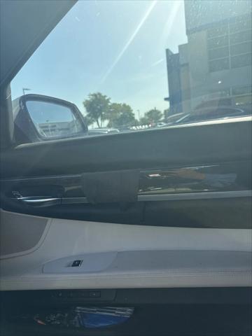 used 2013 BMW 750 car, priced at $7,999