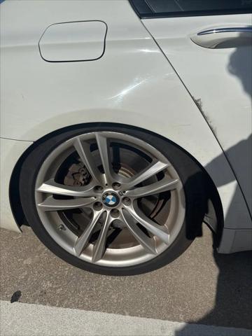 used 2013 BMW 750 car, priced at $7,999