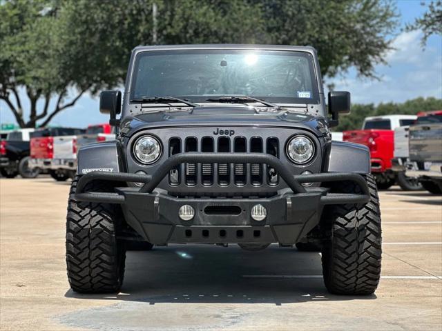 used 2018 Jeep Wrangler JK Unlimited car, priced at $21,998
