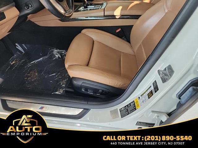 used 2015 BMW 750 car, priced at $11,995