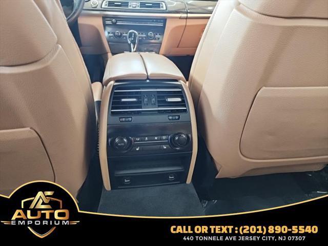 used 2015 BMW 750 car, priced at $11,995