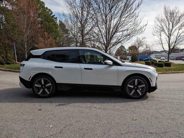 new 2024 BMW iX car, priced at $98,245