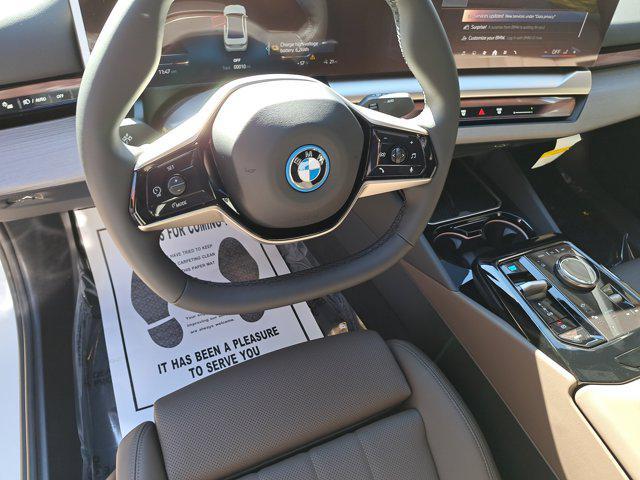 new 2026 BMW i5 car, priced at $76,775