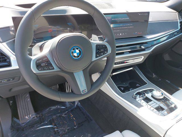 used 2026 BMW X5 PHEV car, priced at $83,981