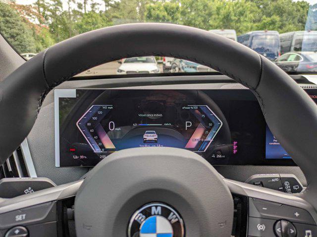 new 2025 BMW iX car, priced at $98,045