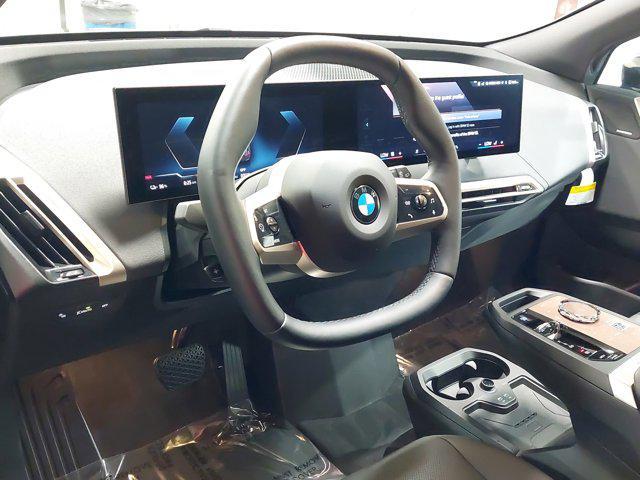 new 2026 BMW iX car, priced at $88,325