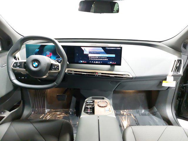 new 2026 BMW iX car, priced at $88,325