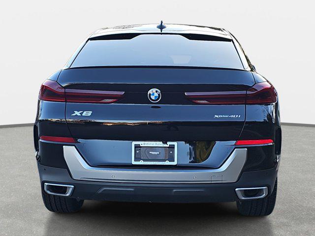 used 2023 BMW X6 car, priced at $63,681