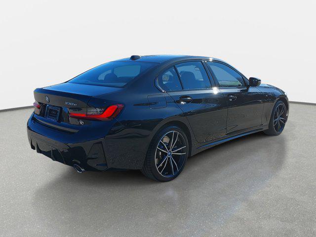 used 2024 BMW 330e car, priced at $39,983