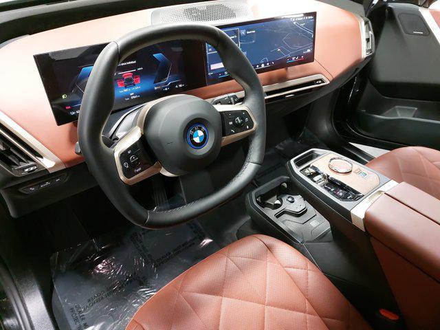 used 2024 BMW iX car, priced at $67,982