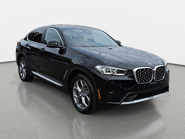 used 2023 BMW X4 car, priced at $41,982