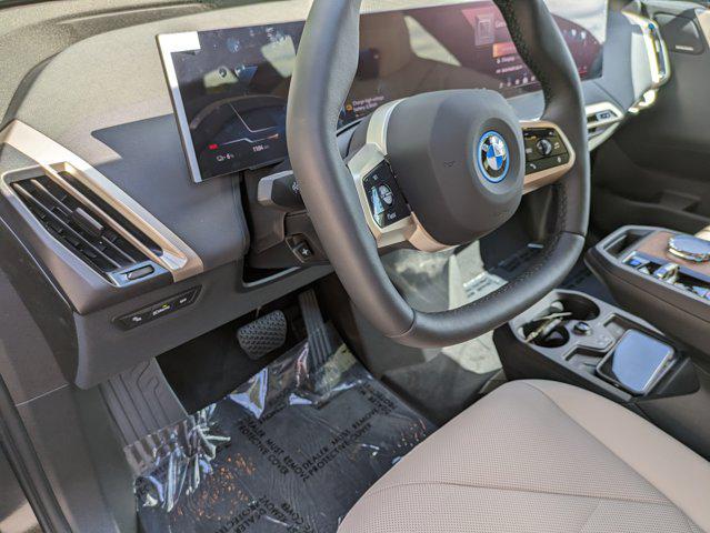 new 2025 BMW iX car, priced at $100,875