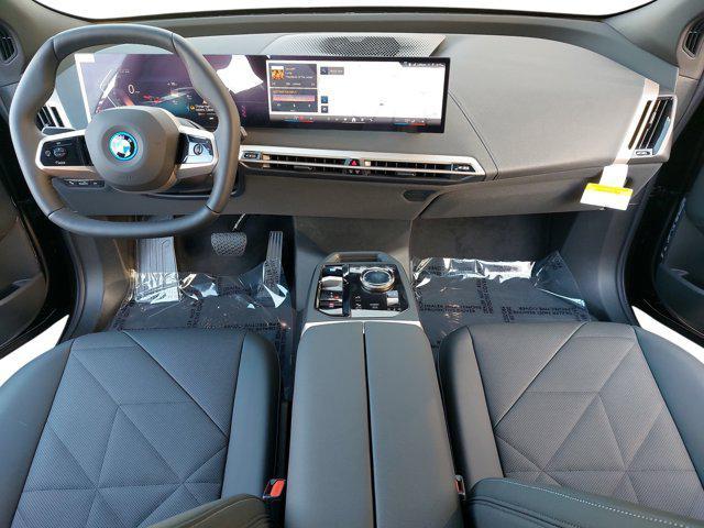 new 2025 BMW iX car, priced at $97,825