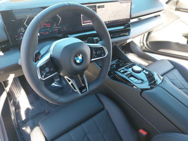 new 2025 BMW 530 car, priced at $68,675