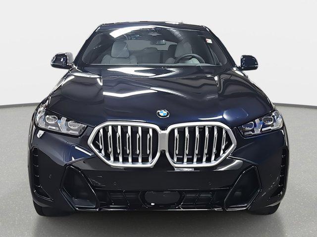 new 2025 BMW X6 car, priced at $77,875