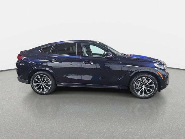 new 2025 BMW X6 car, priced at $77,875