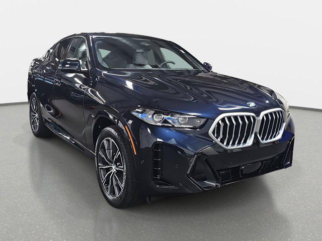 new 2025 BMW X6 car, priced at $77,875