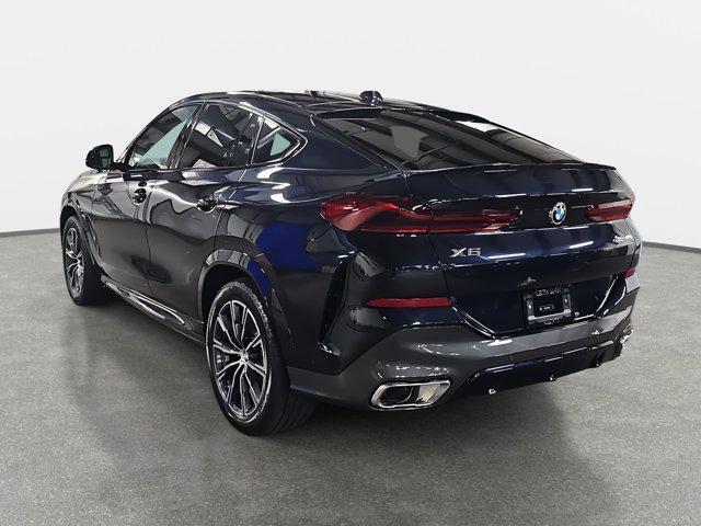 new 2025 BMW X6 car, priced at $77,875