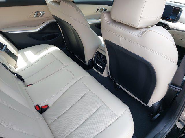 new 2025 BMW 330 car, priced at $51,475