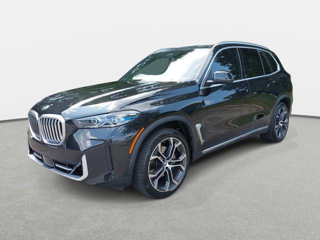 used 2024 BMW X5 car, priced at $61,482