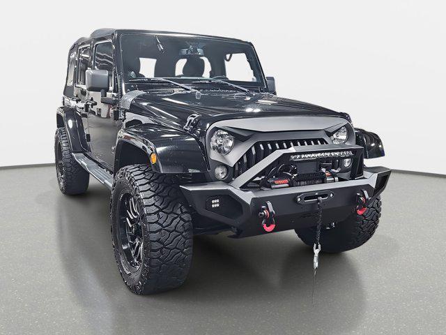 used 2014 Jeep Wrangler Unlimited car, priced at $19,981