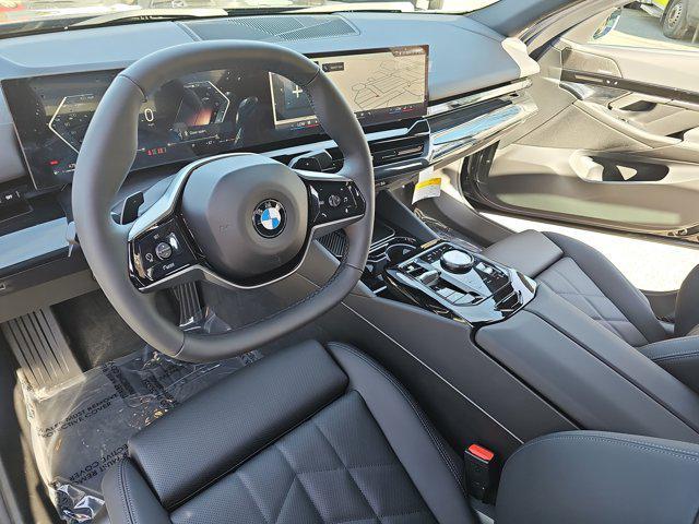 new 2025 BMW 530 car, priced at $63,905