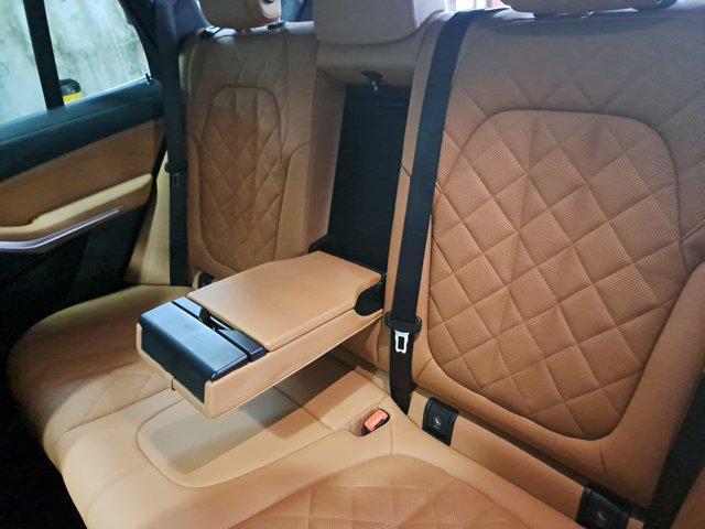 used 2025 BMW X5 PHEV car, priced at $64,262