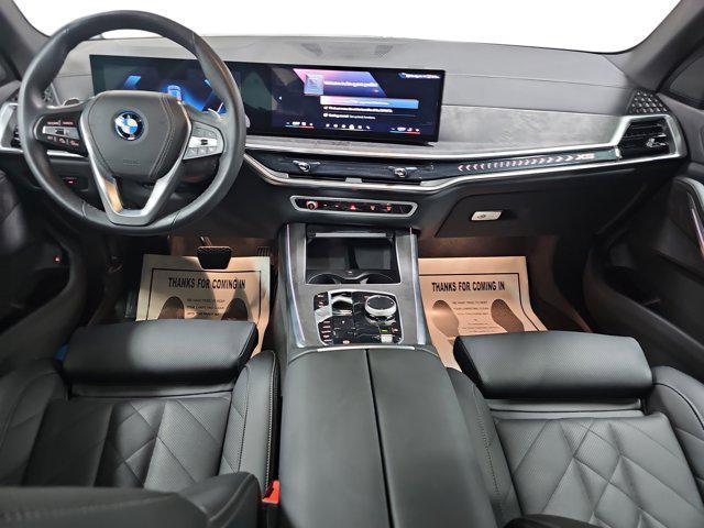used 2025 BMW X5 PHEV car, priced at $66,922